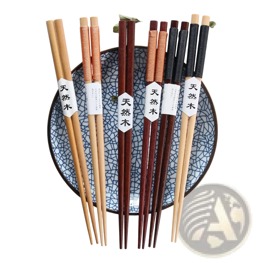 Natural wood chopsticks set in various tones with orange and black textured thread wrapped handles and white labels
