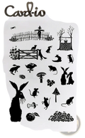 Black silhouette clear stamp set featuring farm animals woodland creatures and garden elements for scrapbooking