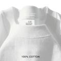 White ribbed cotton turtleneck sweater paired with navy blue cotton round neck t shirt showcasing minimalist design