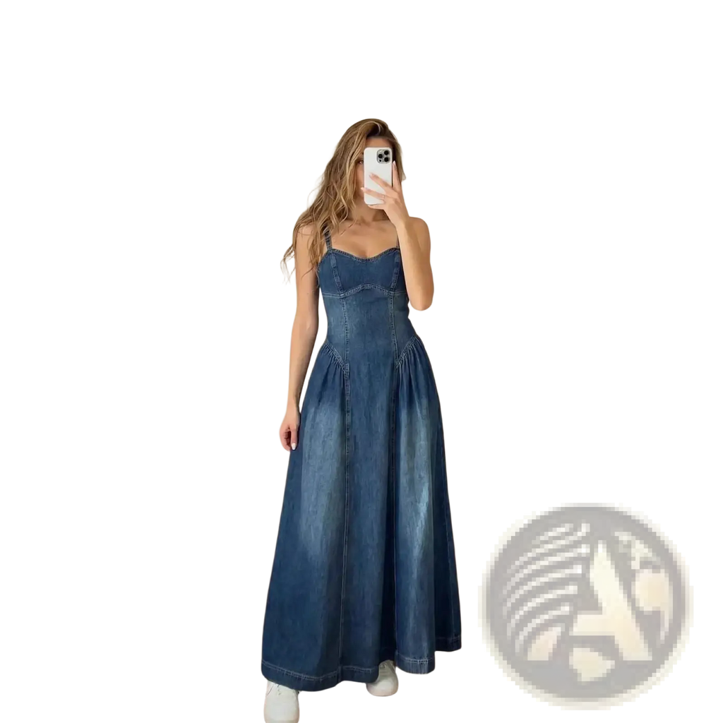 A navy blue denim slip dress with a fitted bodice and flared a-line midi skirt
