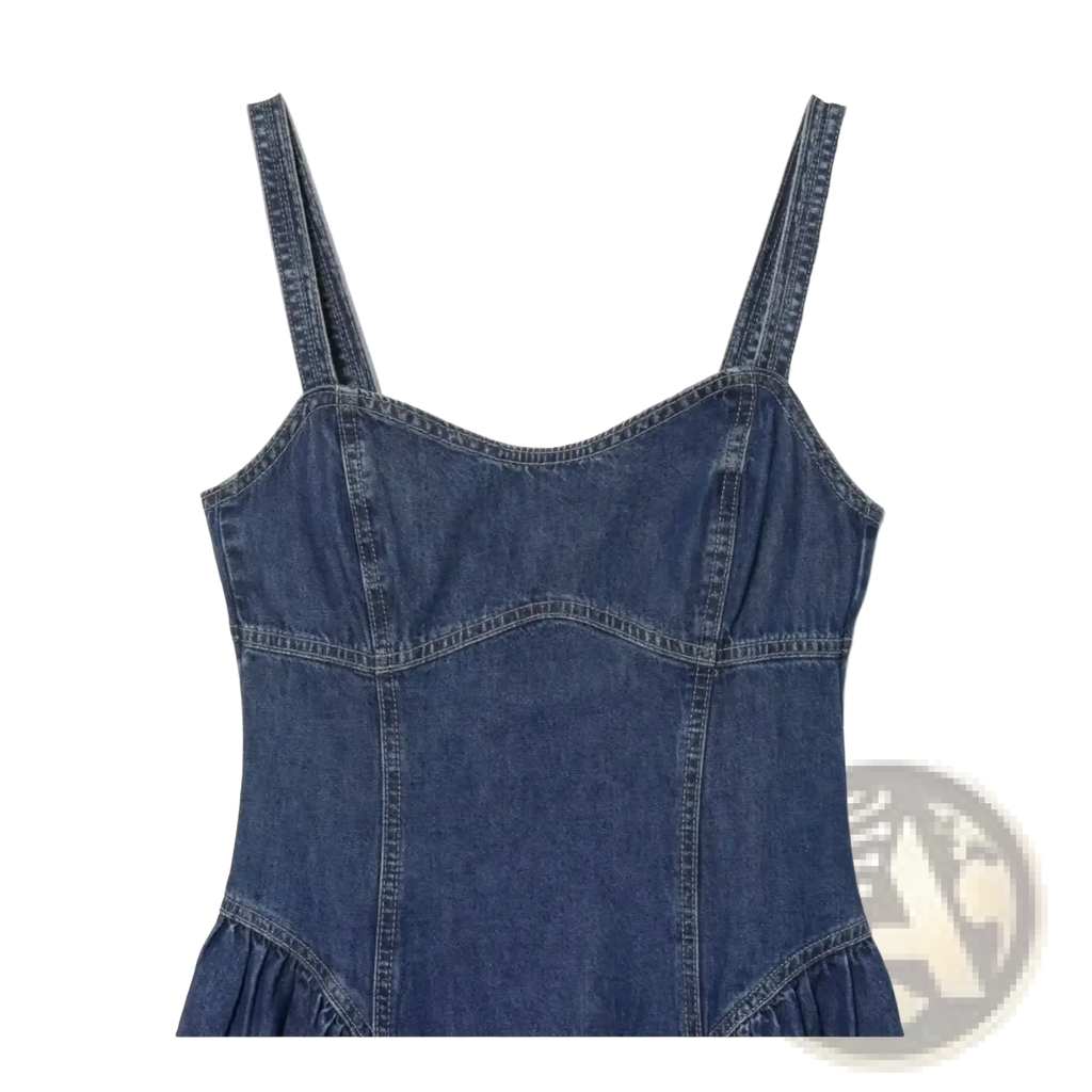 Navy blue denim slip dress with a fitted bodice and ruffled hem in an a-line midi silhouette
