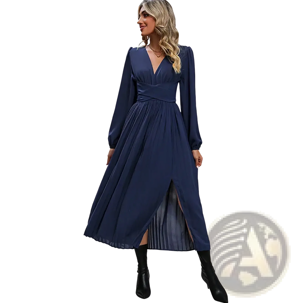 A navy blue long sleeve midi dress with v-neckline, gathered waistband, and pleated skirt with side slit