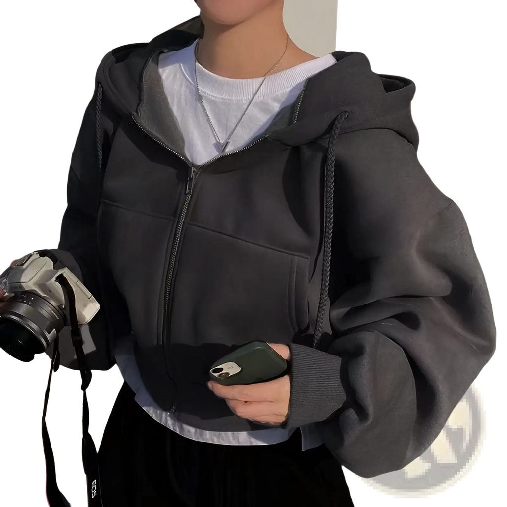 Black zip-up hoodie with drawstrings and front pockets complementing navy blue velvet padded slim fit sweater