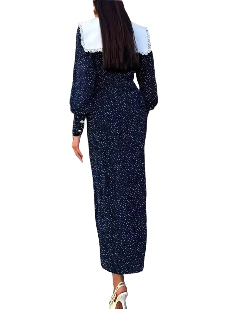 A navy blue velvet bodycon maxi dress with white polka dots and a white lace-trimmed collar