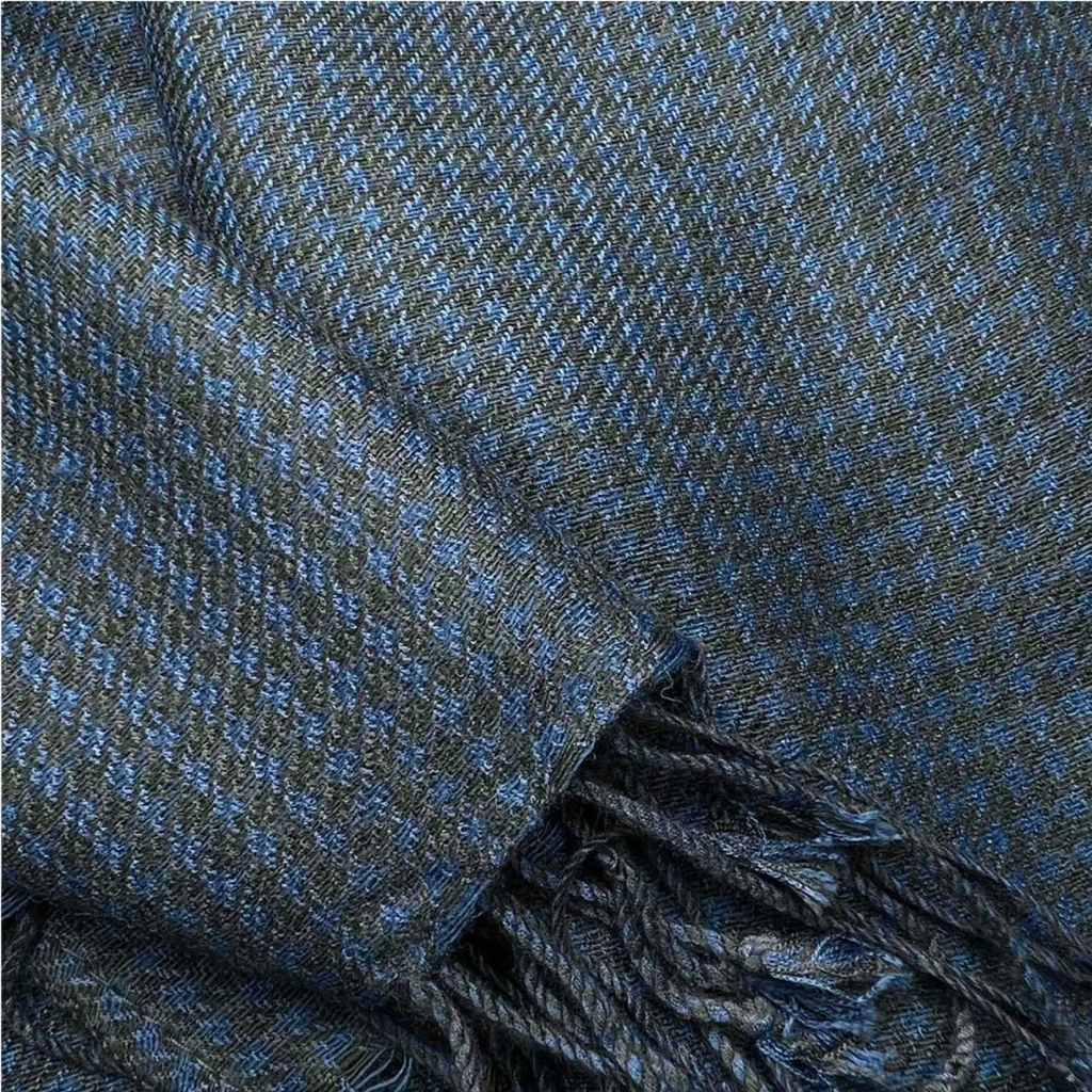 Navy jacquard herringbone scarf made of dark blue and gray wool with a textured weave and fringed edges