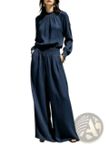 Navy satin blouse with high neckline and long sleeves made of silk paired with wide leg pants set