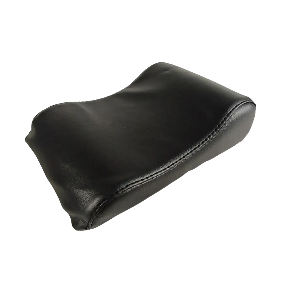 Black leather neck support pillow with stitched edges designed for pilates reformer use
