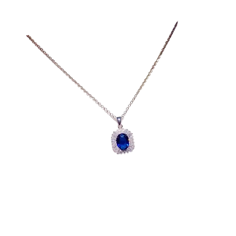 Delicate silver chain necklace pendant with a created sapphire blue oval gemstone and clear stone halo fine jewelry