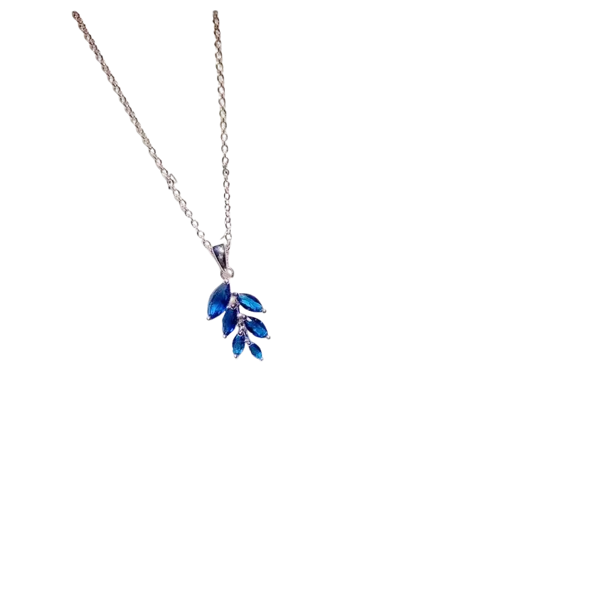 A fine jewelry silver necklace pendant with a leaf-shaped design featuring five blue created sapphire stones