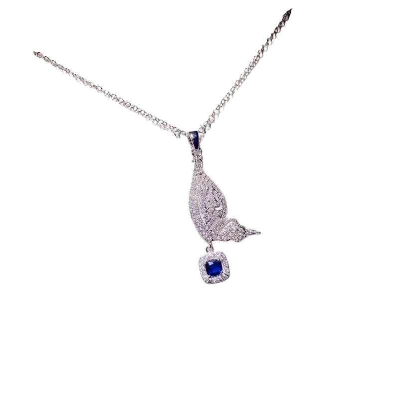 Silver butterfly necklace pendant with created sapphire blue gemstone and clear stones designed as fine jewelry