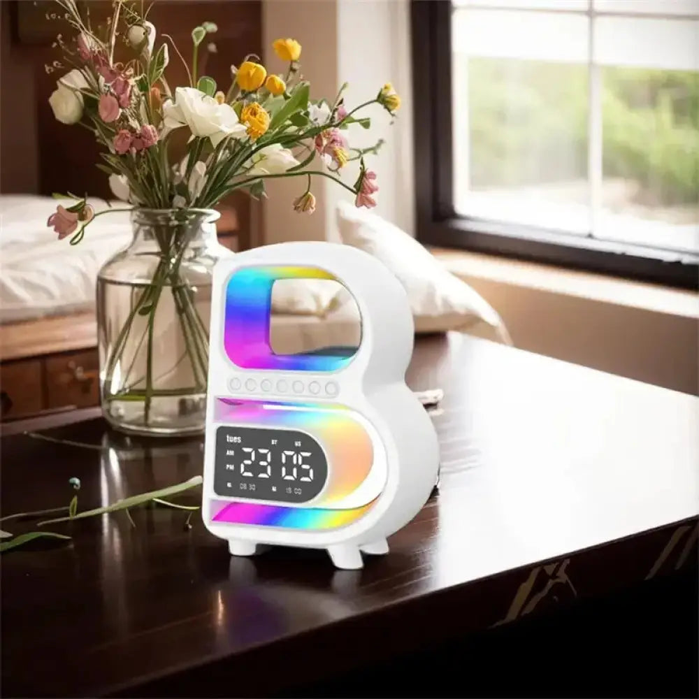 White digital alarm clock with rainbow led lighting in smart b-shaped rgb bluetooth speaker and wireless charger design
