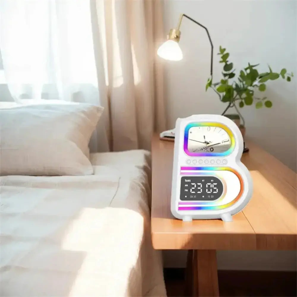 White smart b-shaped rgb bluetooth speaker and wireless charger with rainbow led clock and analog airplane face
