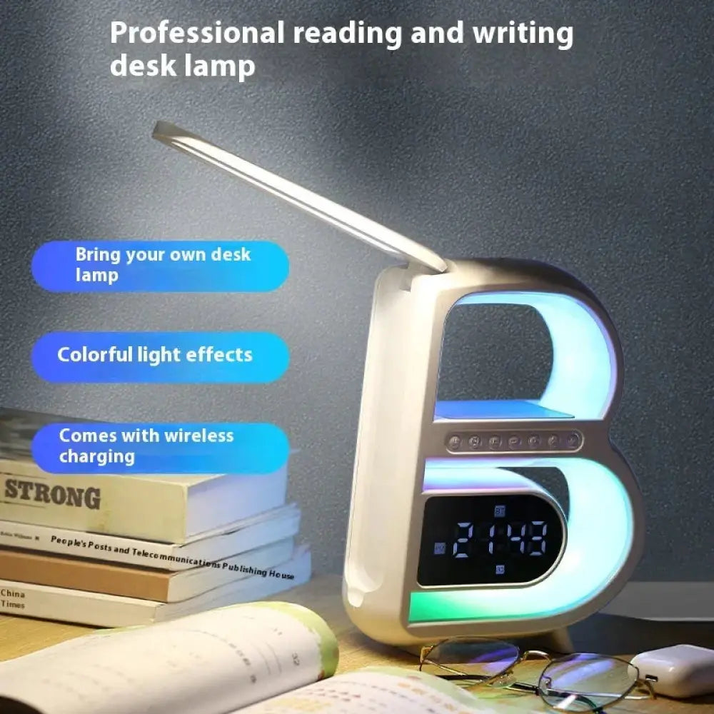 Smart b-shaped RGB Bluetooth speaker and wireless charger with white plastic body and blue LED light edges