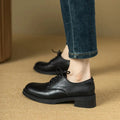 Black leather round toe women’s british oxford shoes with lace-up design and low block heel