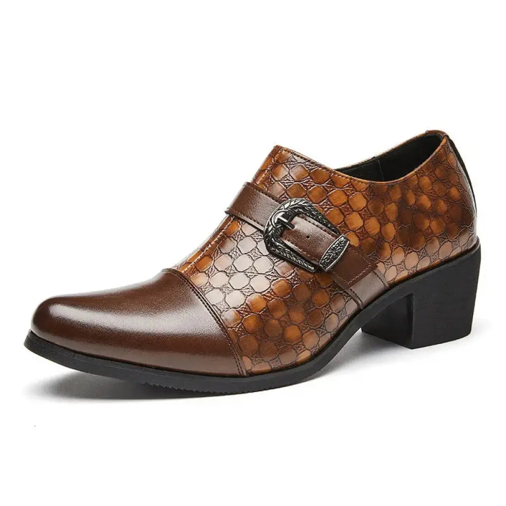 Brown leather men’s dress shoe with crocodile skin pattern, buckle strap, and low block heel for formal wear
