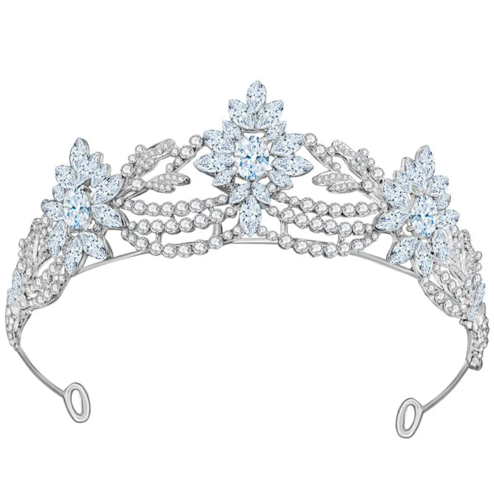 A sparkling silver floral 3a zirconia bridal tiara with pastel crystals and a central light blue gemstone