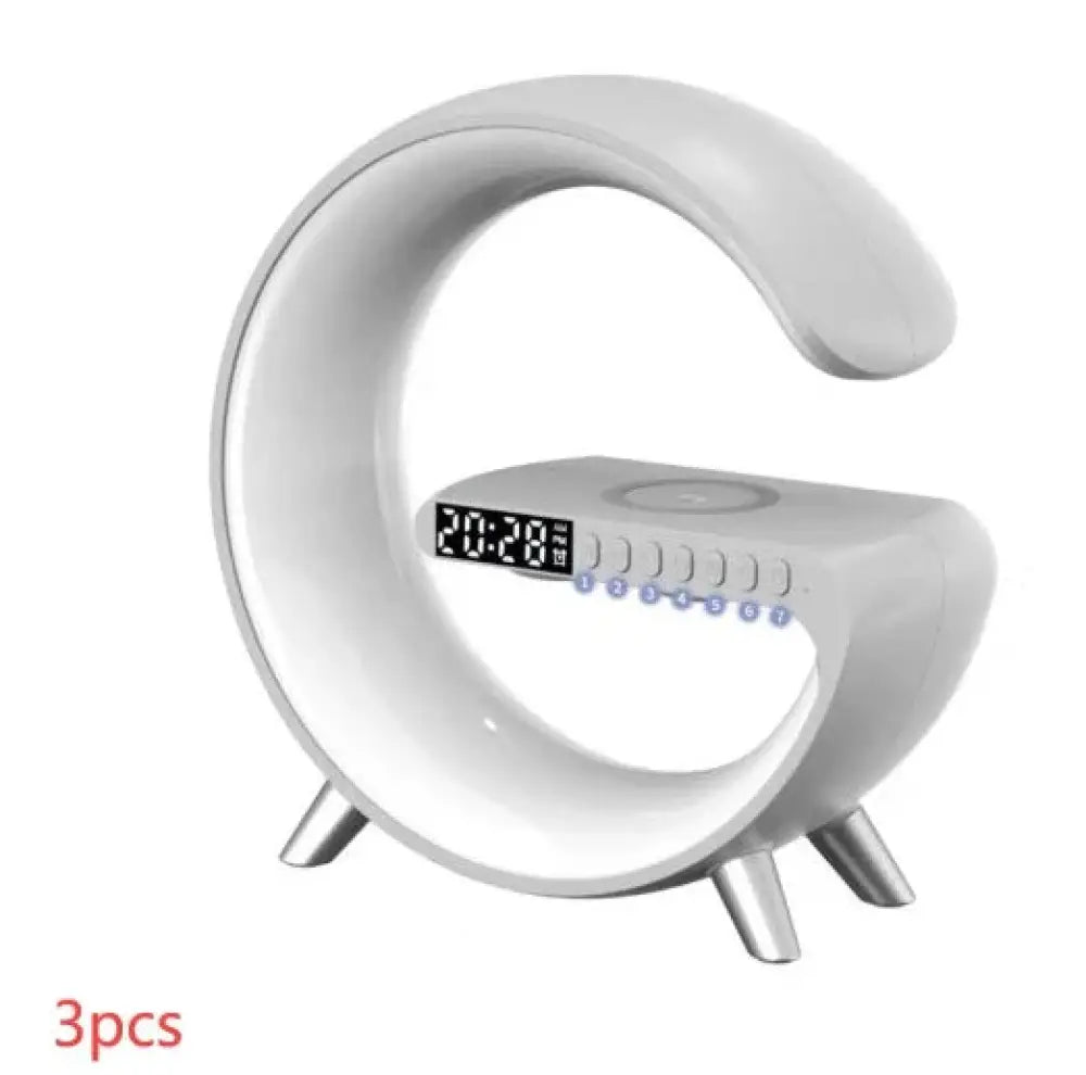 White sleek c-shaped g-shaped led lamp with bluetooth speaker wireless charger and metallic legs minimalist design