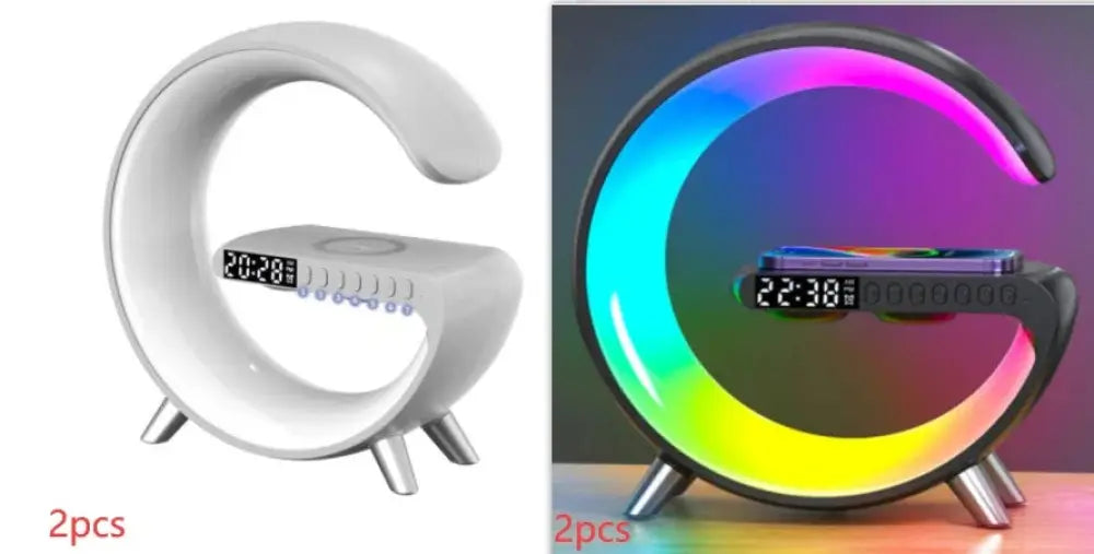 White crescent-shaped g-shaped LED lamp with Bluetooth speaker wireless charger and three metallic legs digital clock