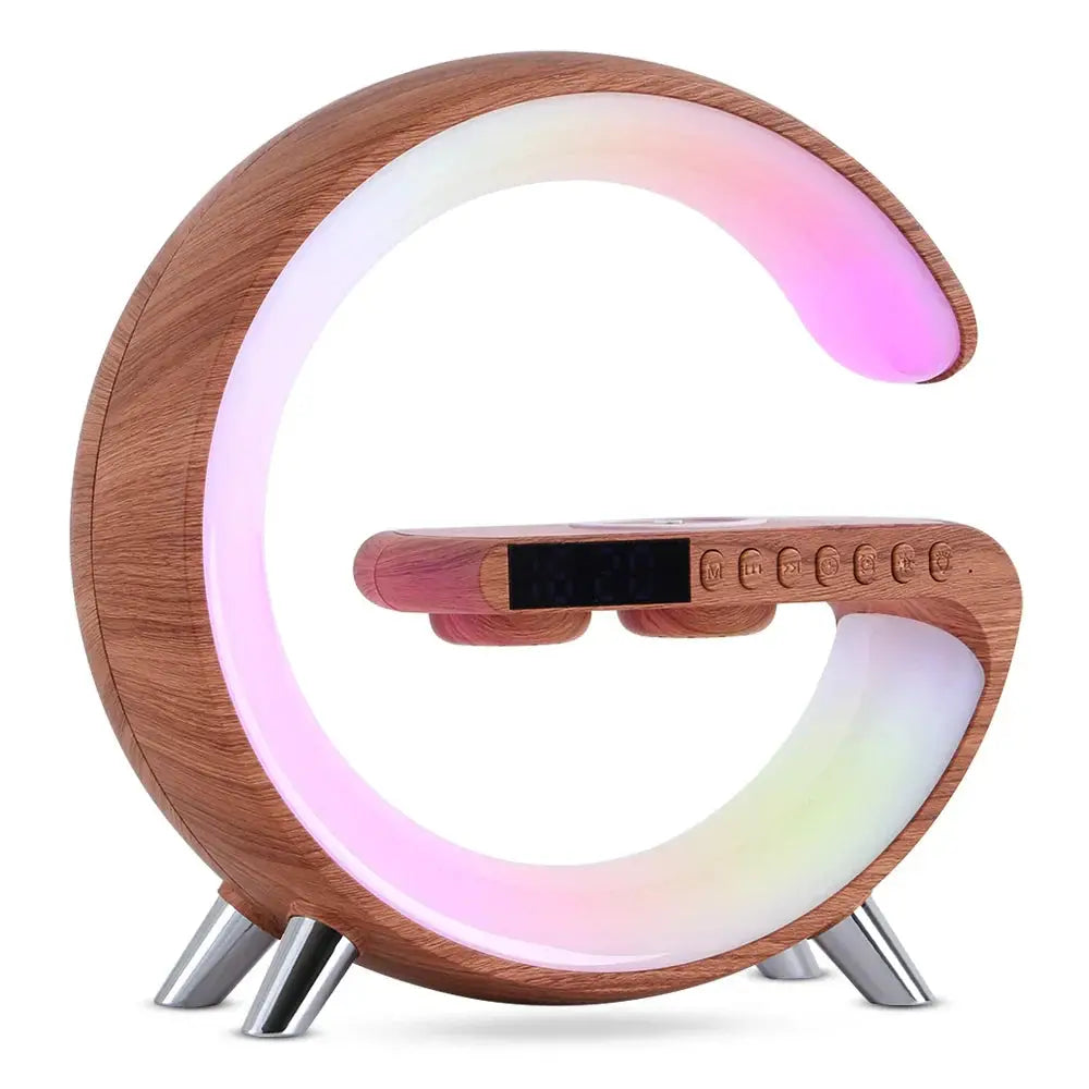 G-shaped wooden lamp with glowing pink and white led ring, silver metallic legs, bluetooth speaker, and wireless charger