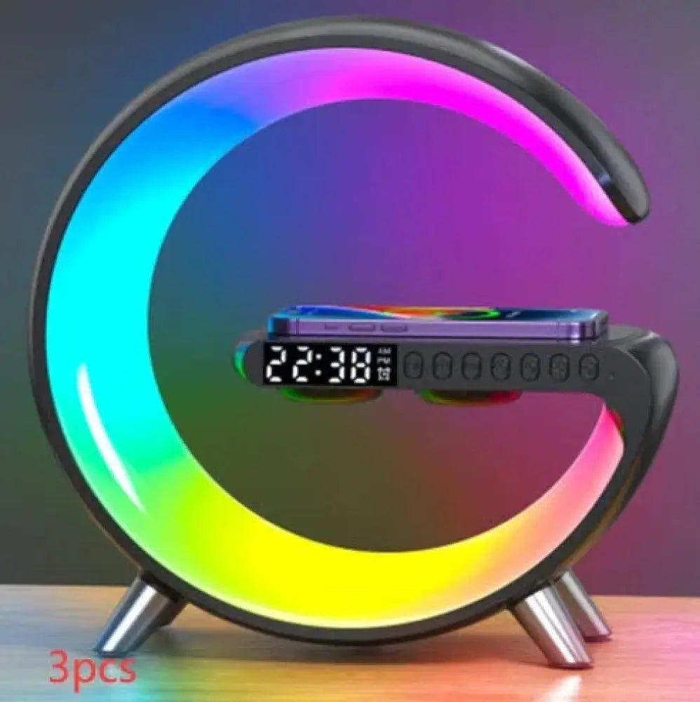 G-shaped led lamp in sleek black with a rainbow light ring digital clock bluetooth speaker and wireless charger