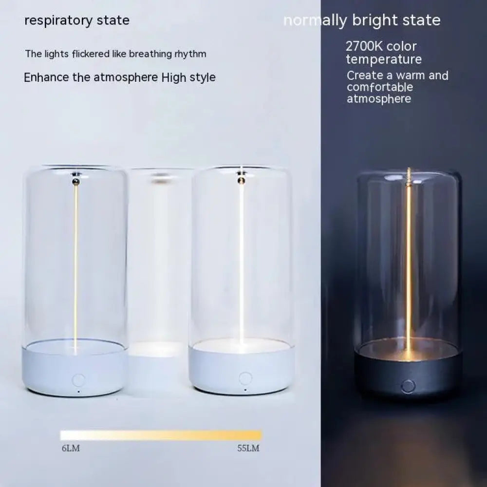 Modern rechargeable led filament camping lantern with clear glass enclosure, white or dark gray base, and warm 2700k illumination
