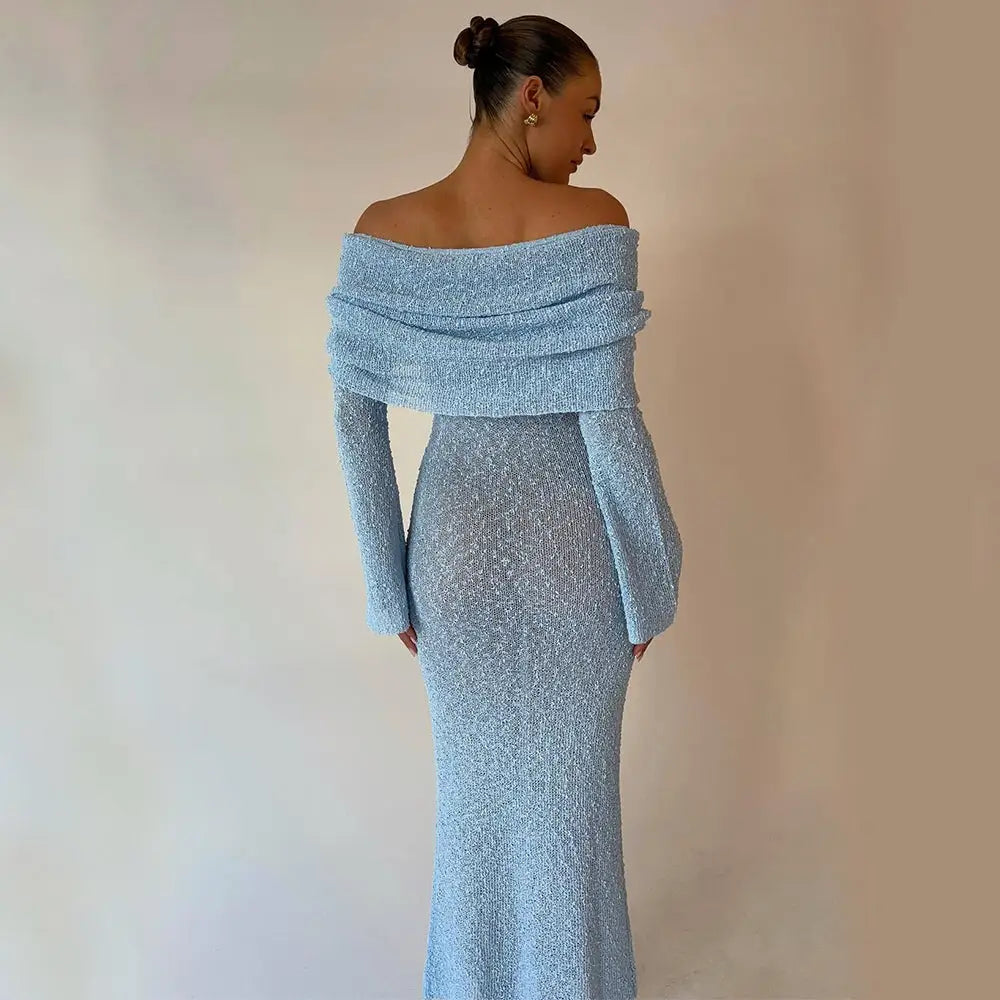 Shimmering light blue off-the-shoulder knit maxi beach dress with long sleeves and a fitted silhouette