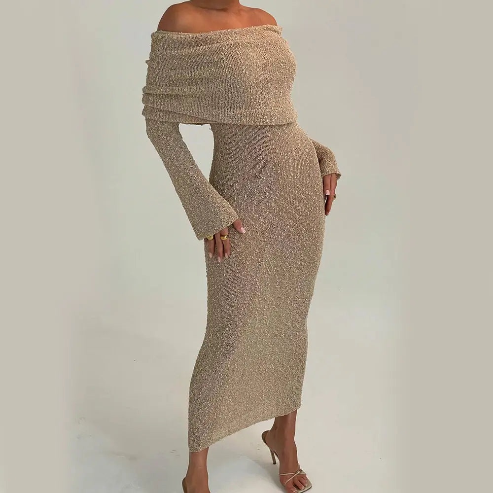 A shimmering gold knit off-the-shoulder two-piece set with long sleeves and a form-fitting midi skirt