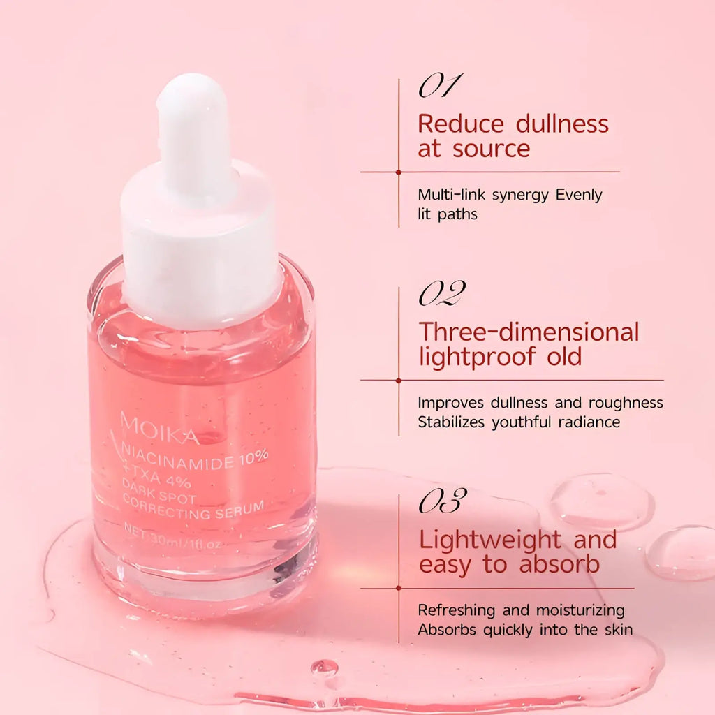 A clear glass bottle with white dropper cap contains pink niacinamide 10% txa 4% dark spot correcting serum 30ml