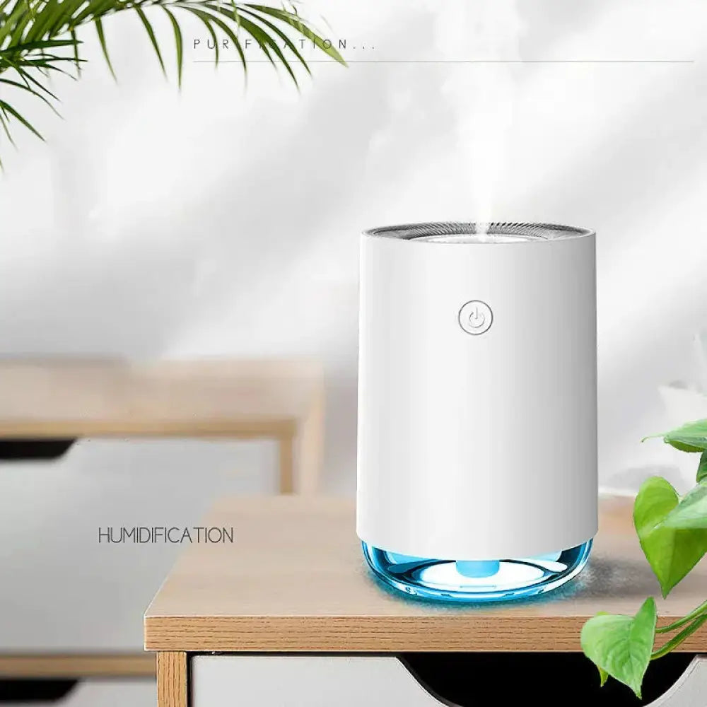 Modern 3-in-1 led night light and essential oil diffuser white cylindrical humidifier with transparent blue base and power button