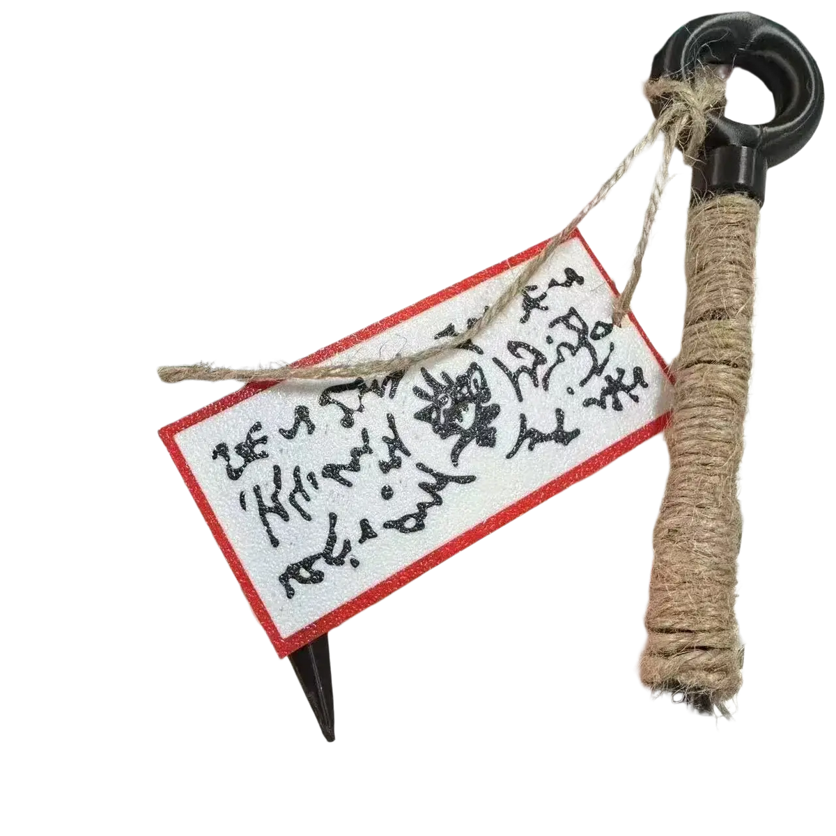 Black handcrafted ninja kunai pen with textured handle wrapped in natural twine and a sleek metallic tip