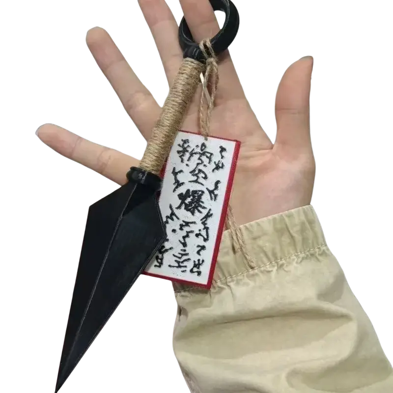 Black plastic ninja kunai fridge magnet with rope wrapped handle and circular black pvc grip shuriken toy