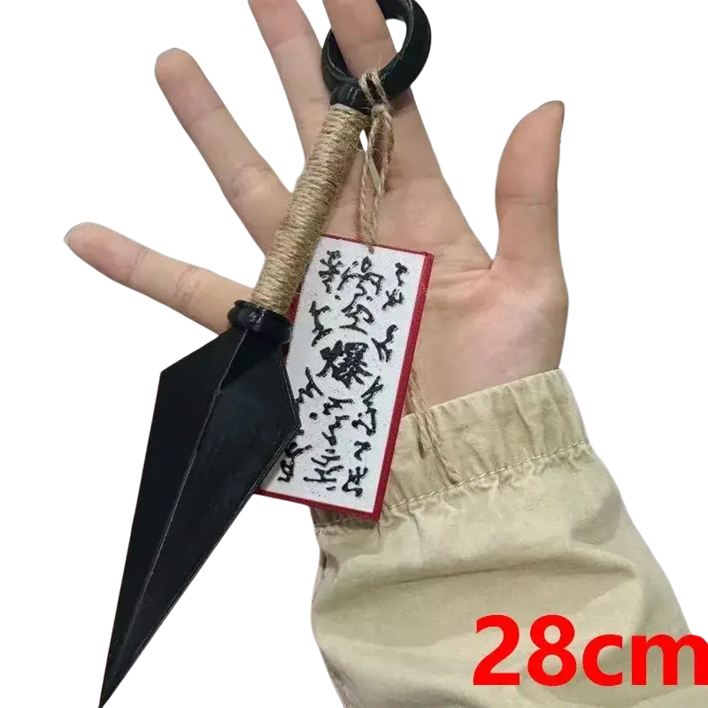 Black plastic ninja kunai fridge magnet with wrapped handle and red-bordered tag made of PVC shuriken toy