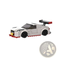 White and red lego nismo r35 racing car toy with black wheels and rear spoiler built from 251pcs blocks