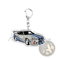 Clear acrylic Nissan Skyline acrylic car keychain featuring white and blue striped R34 with racing decals