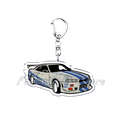 Clear acrylic Nissan Skyline acrylic car keychain featuring white and blue striped R34 with racing decals