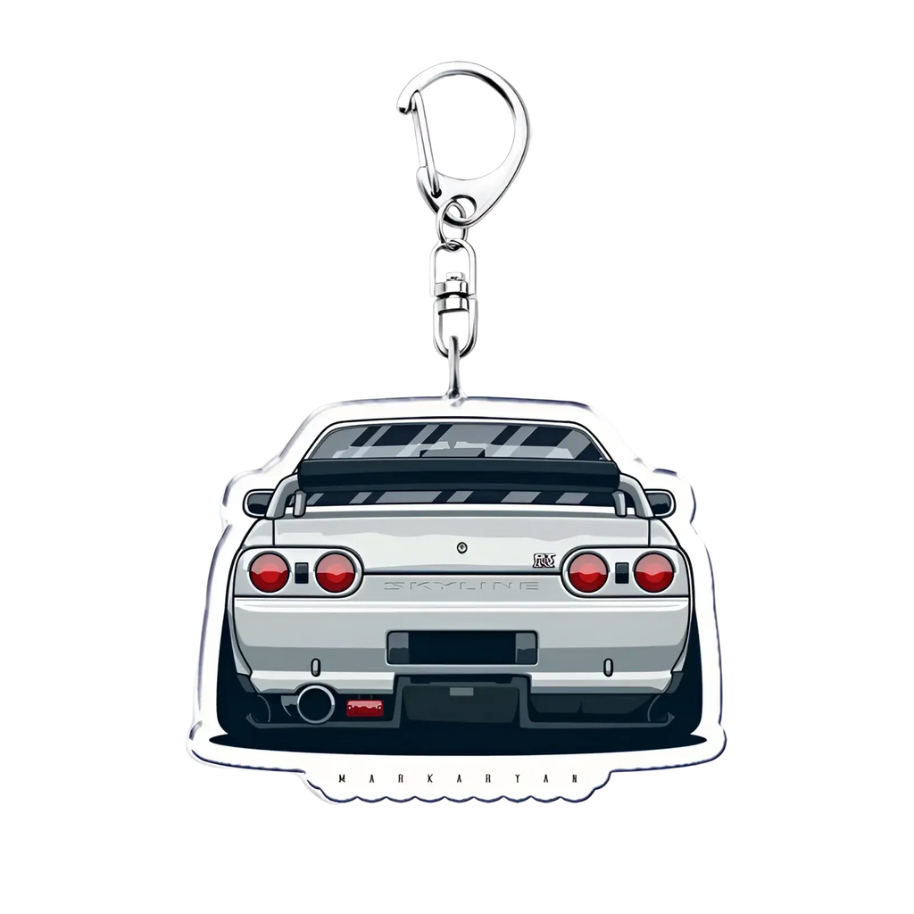 Silver acrylic nissan skyline r34 keychain showing stylized rear view with red taillights and black spoiler