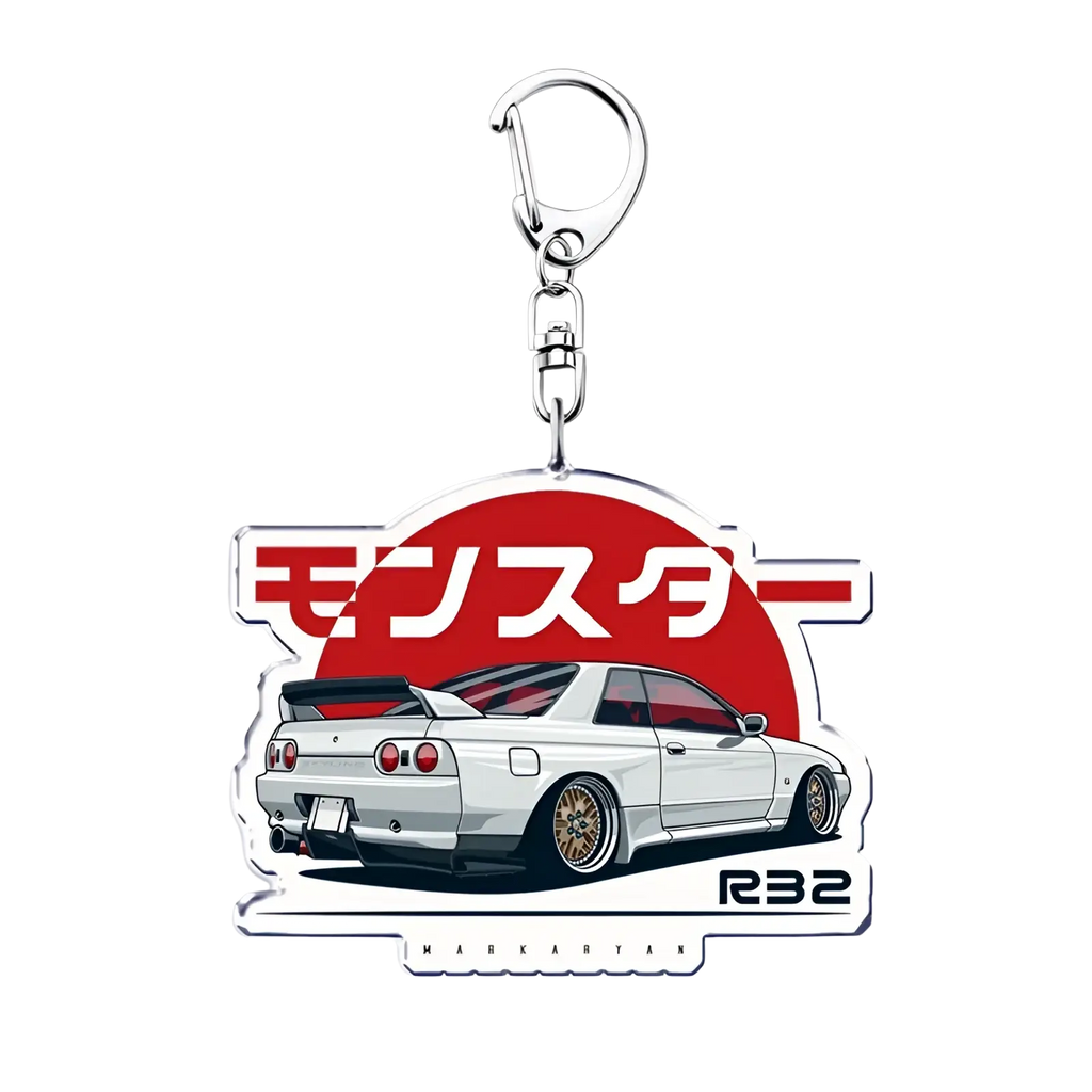 Nissan Skyline acrylic car keychain featuring a white r32 with gold rims and red taillights on a clear acrylic keychain