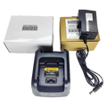 Black plastic nntn8234a battery charger with yellow caution label and coiled power cord for motorola radio