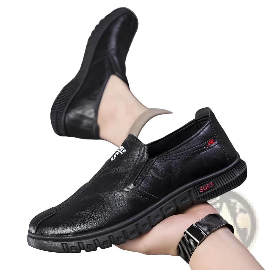 Black leather slip-on non-slip chef shoe with textured sole and red soft branding on the heel back side