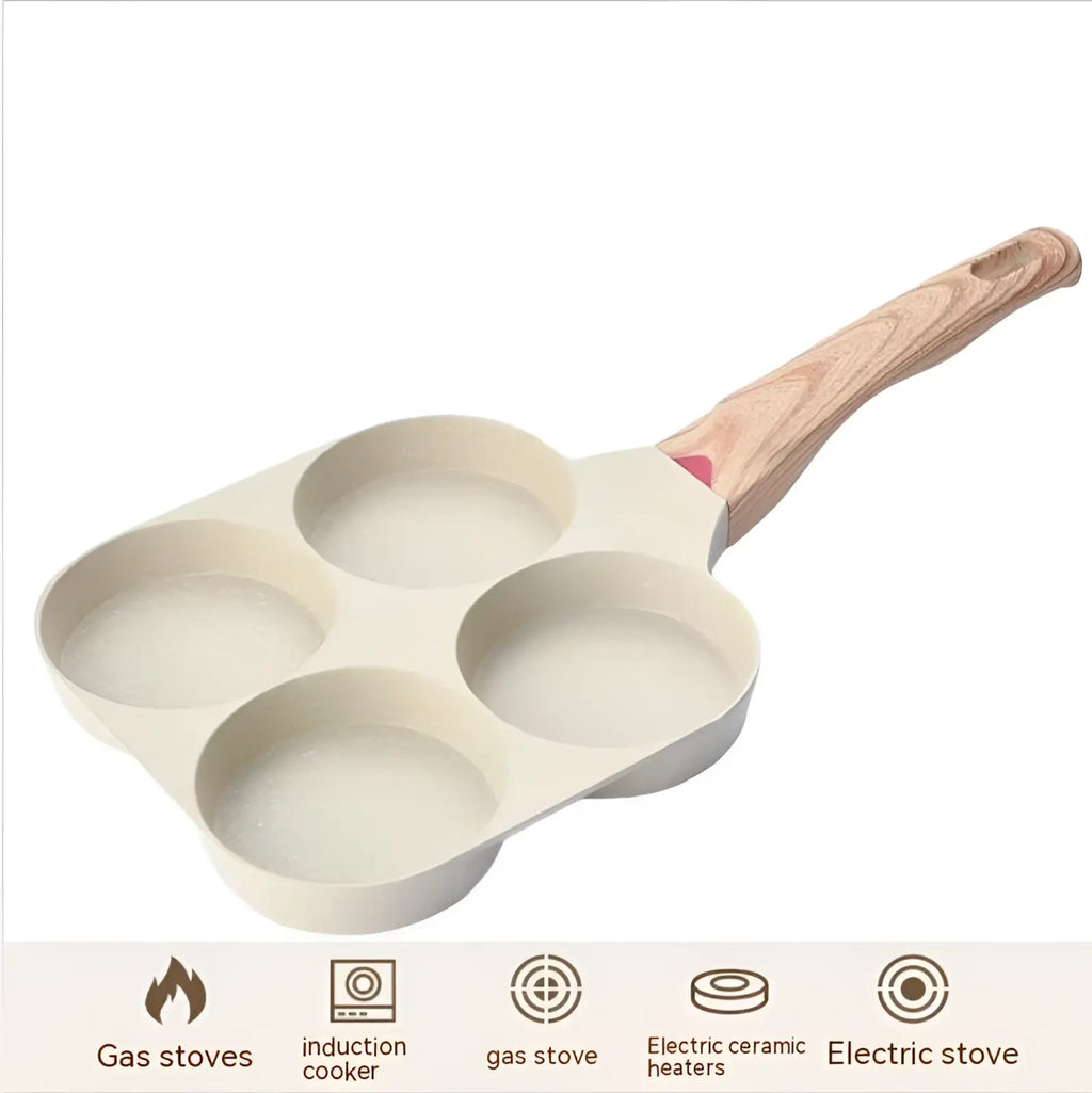 Beige nonstick four-hole egg frying pan with wooden handle designed for even cooking