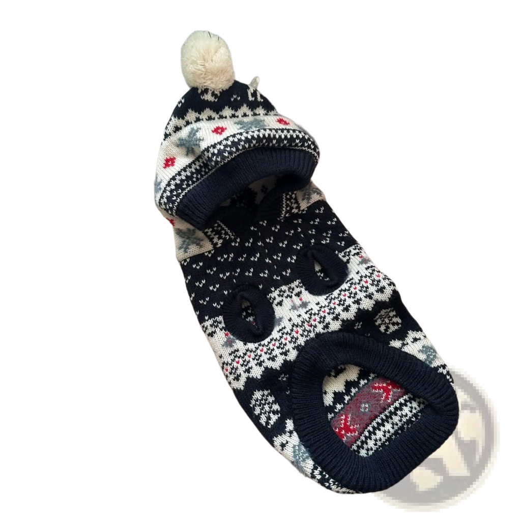 Cozy navy blue white and red knitted nordic knit dog sweater with festive pattern and pom-pom for warm winter wear