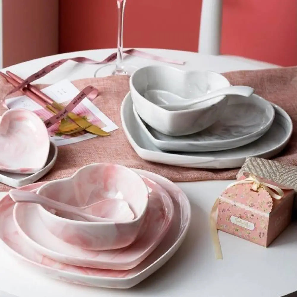 Pink and white marbled heart-shaped ceramic dinnerware set from nordic marbled collection for elegant table settings