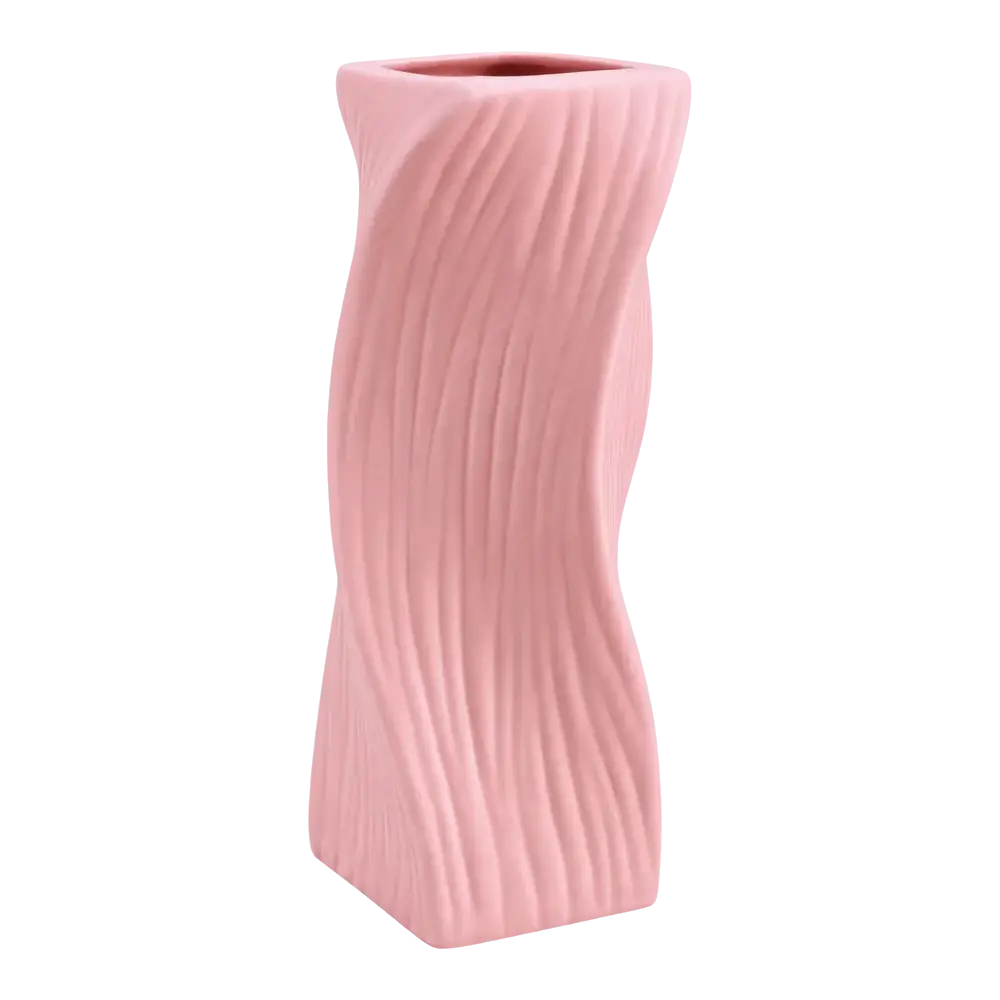 A sleek blush pink ceramic nordic wave plastic flower vase with modern twisted design and vertical ribbed texture