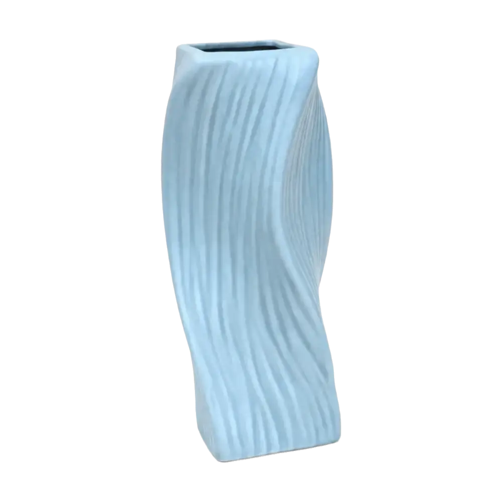 A sleek light blue ceramic nordic wave plastic flower vase with modern twisted design and vertical ribbed texture