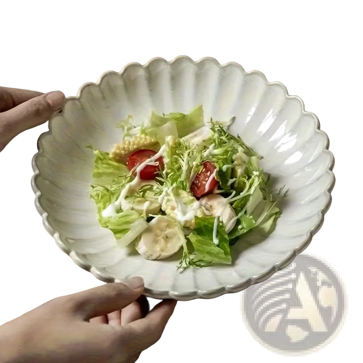 A white ceramic scalloped salad bowl with vertical ridges and kemorela logo, matching the Nordic White dinner plate