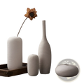 Nordic white ribbed ceramic vases in varying heights and shapes with vertical texture for modern home decor