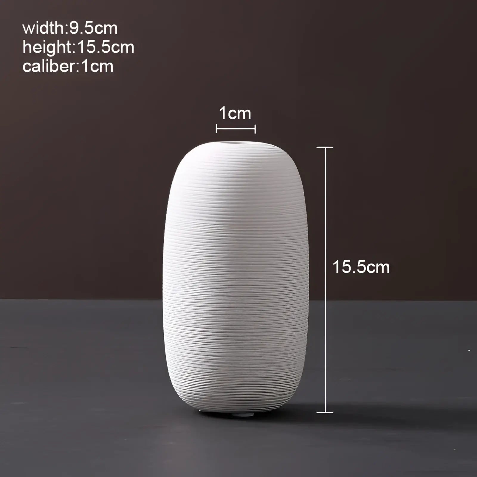 Nordic white ribbed ceramic vase with vertical texture and rounded elongated shape for modern home decor