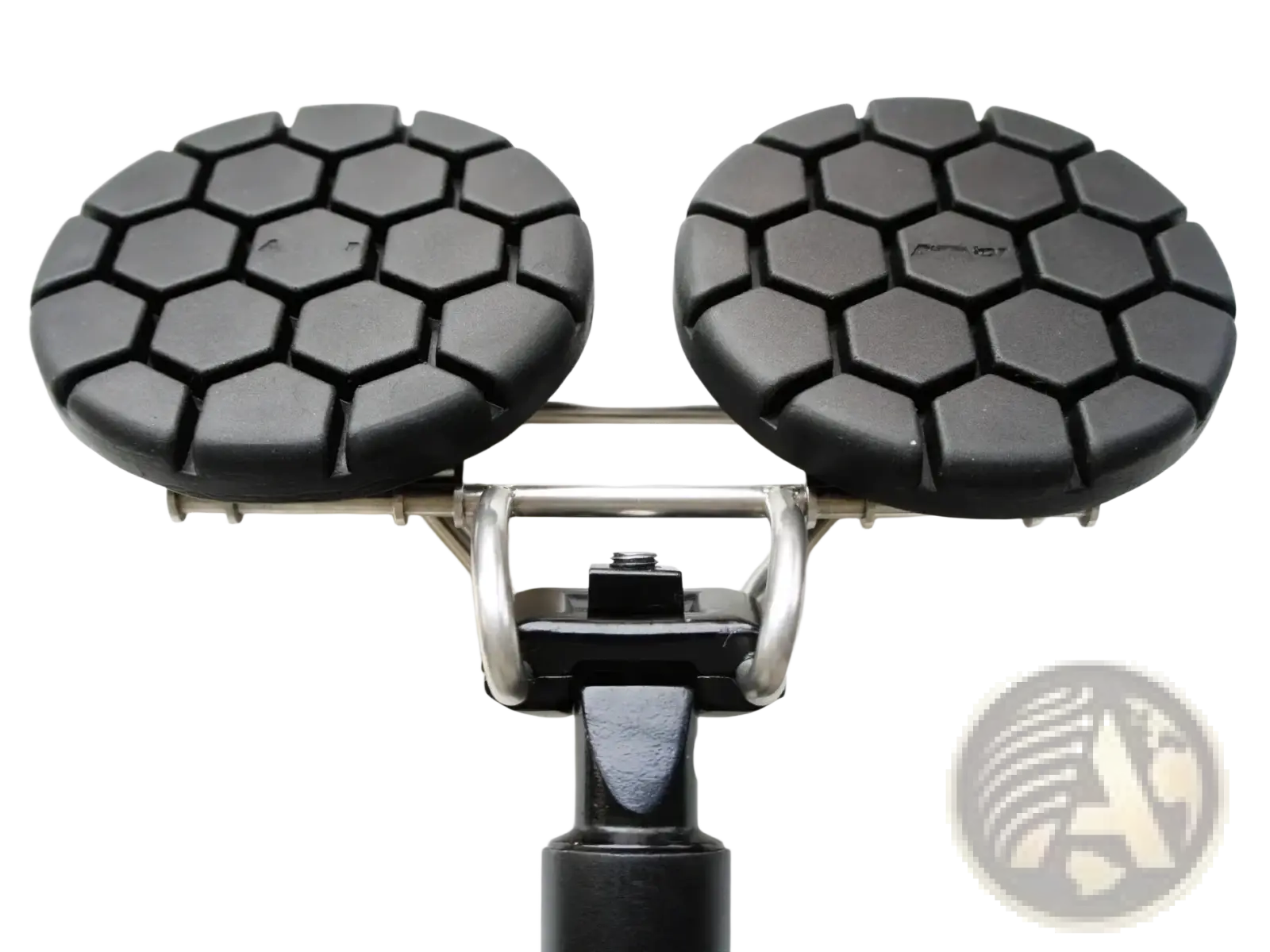 Black hexagonal-patterned rubber pads on a metallic frame with a cylindrical base for noseless ergonomic long distance bicycle saddle