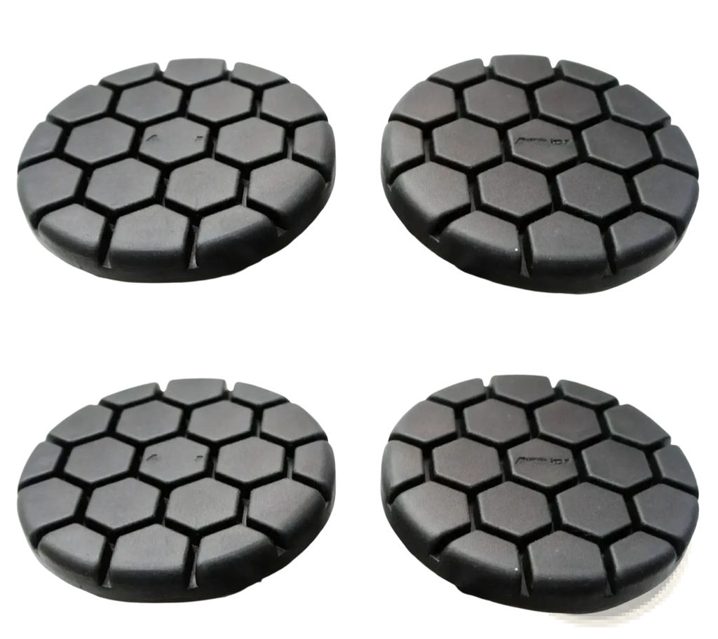 Black hexagonal-patterned car wheel covers designed for durability and style in automotive use