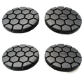Black hexagonal-patterned car wheel covers designed for durability and style in automotive use